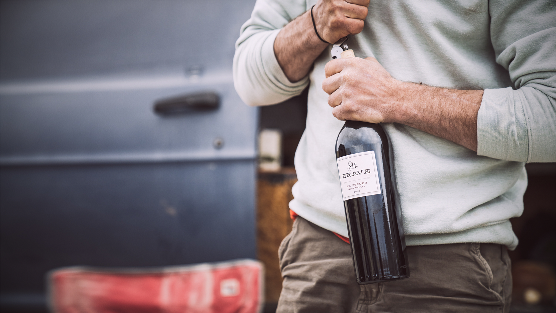 Man holding wine bottle